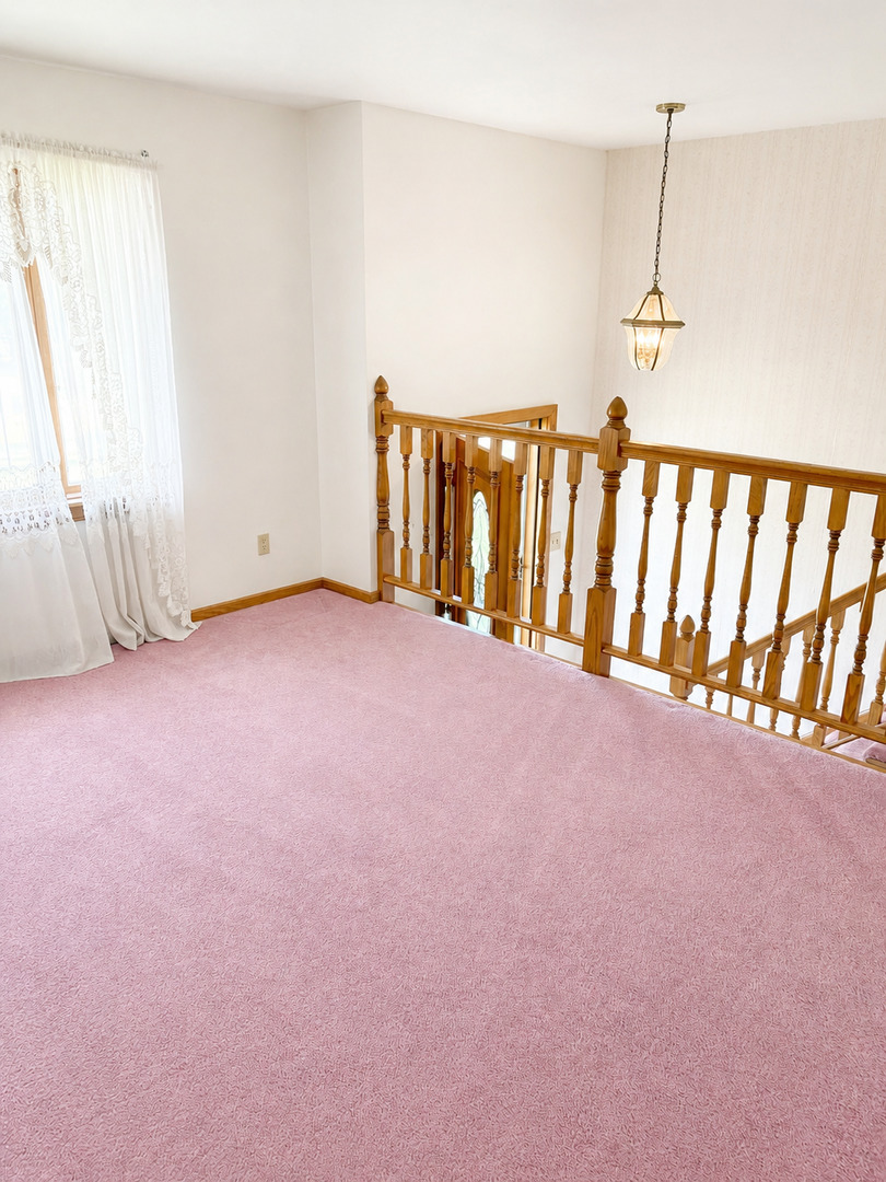 1707 Wright Street Streator, IL 61364 - Photo 4 of 9 a view of an empty room with a window