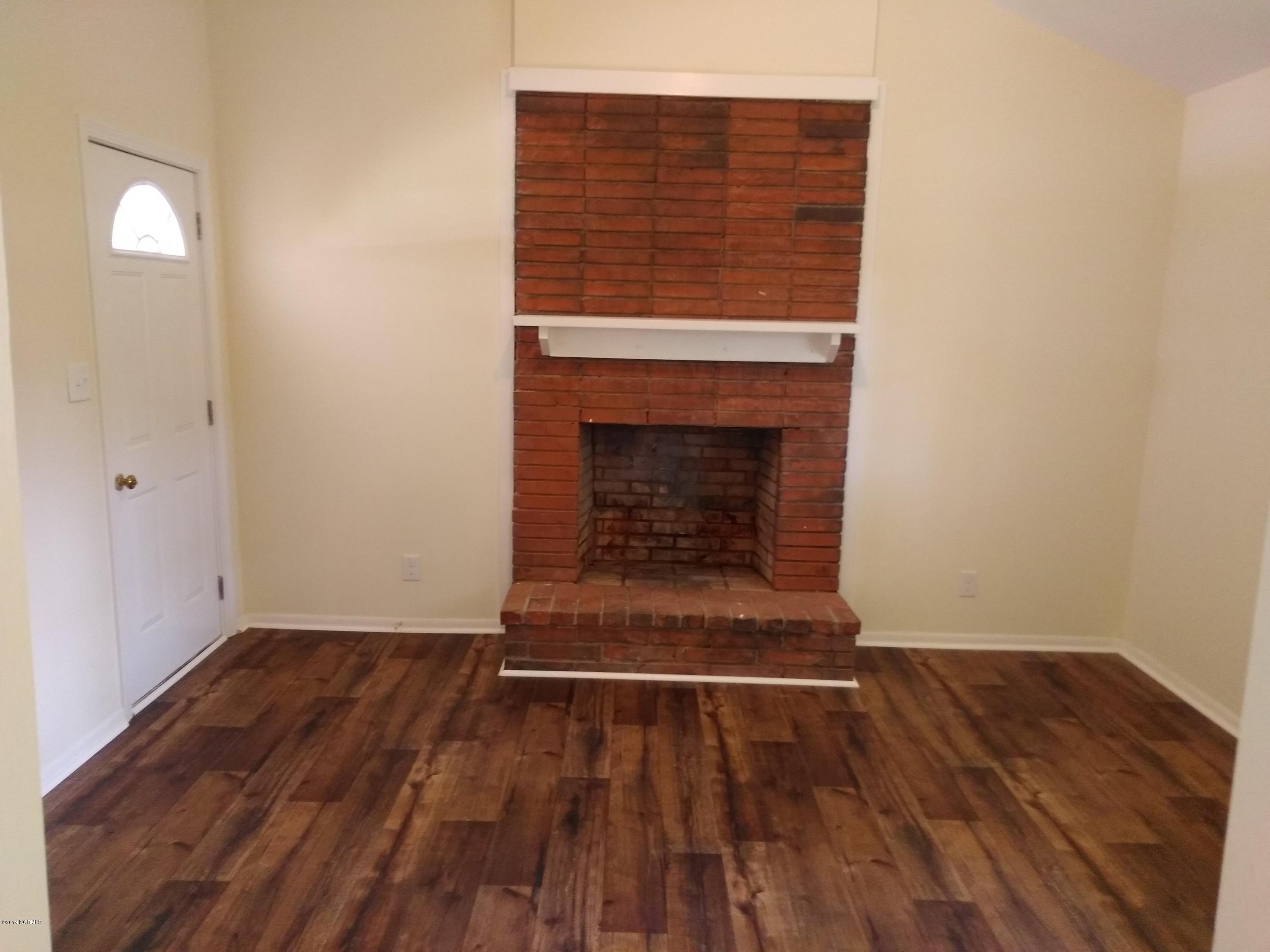 143 Crestview Road Rocky Mount, NC 27801 - Photo 5 of 11 Wood burning fireplace