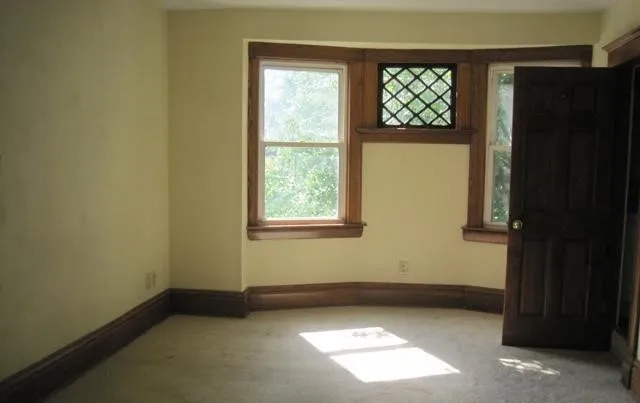 an empty room with windows