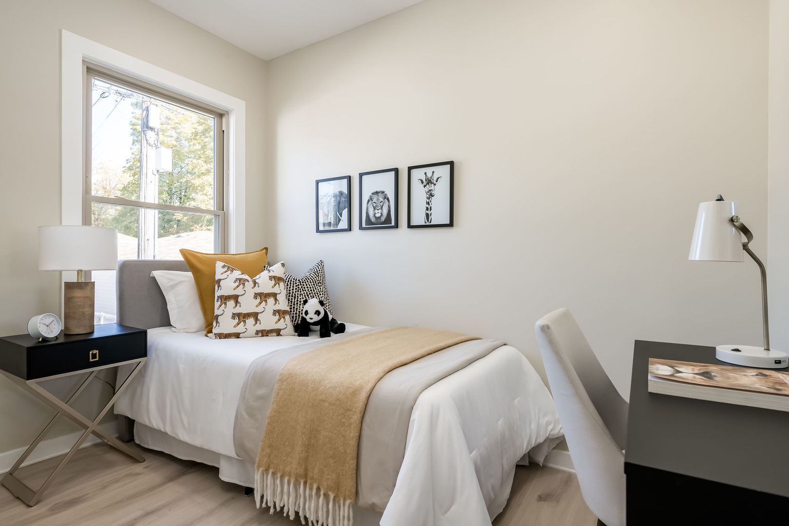 5144 North Kolmar Avenue Chicago, IL 60630 - Photo 15 of 27 a bedroom with a bed and a large window