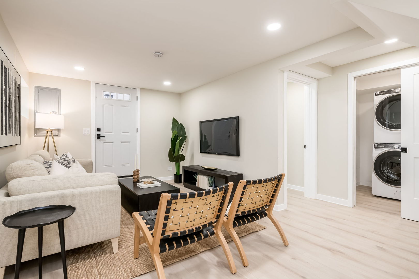 5144 North Kolmar Avenue Chicago, IL 60630 - Photo 18 of 27 a living room with furniture and a flat screen tv