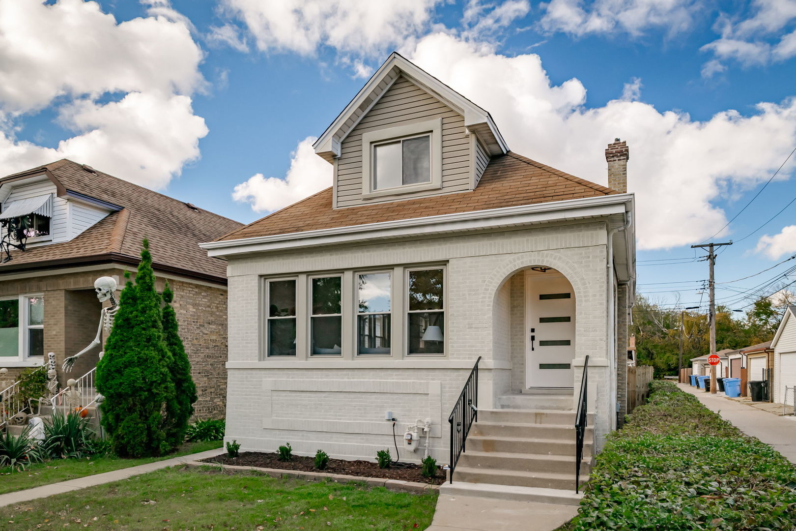 5144 North Kolmar Avenue Chicago, IL 60630 - Photo 2 of 27 a front view of a house with a yard