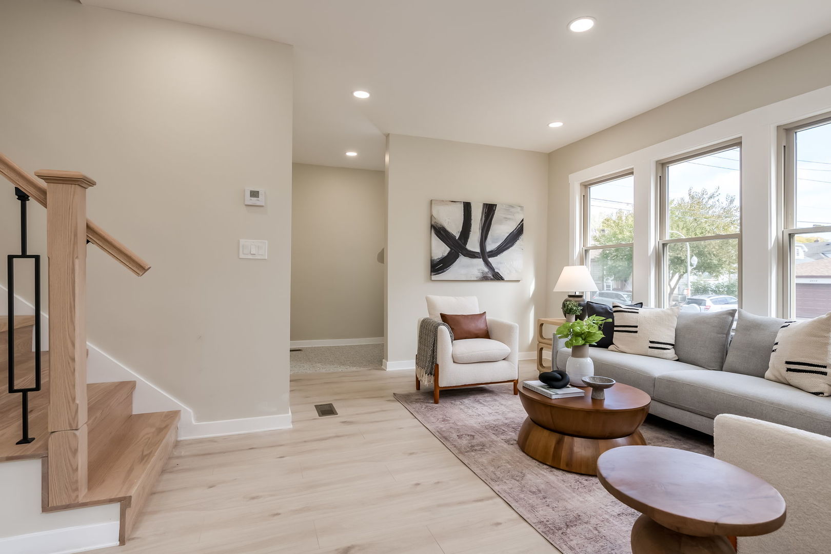 5144 North Kolmar Avenue Chicago, IL 60630 - Photo 4 of 27 a living room with furniture and a large window
