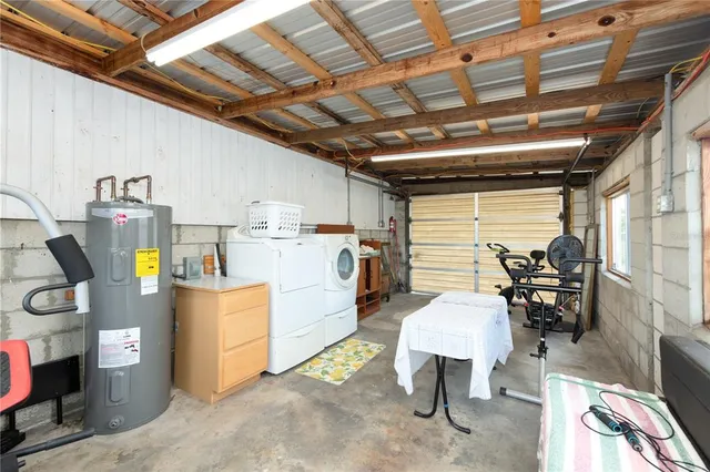 a storage room with washer and dryer