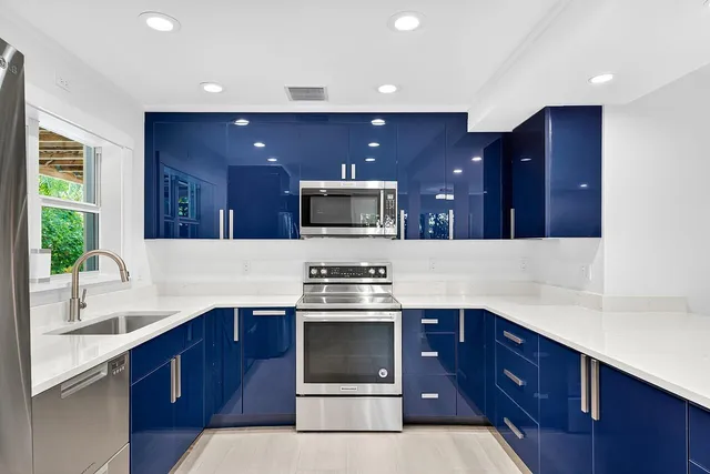 a kitchen with a stove and a sink