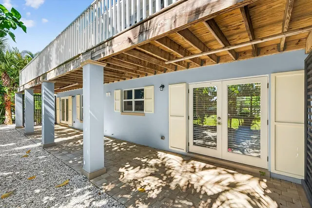a view of backyard with large tree