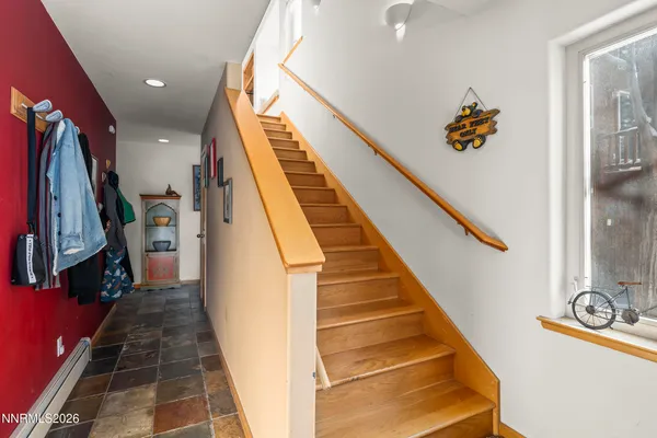 a view of entryway with a front door