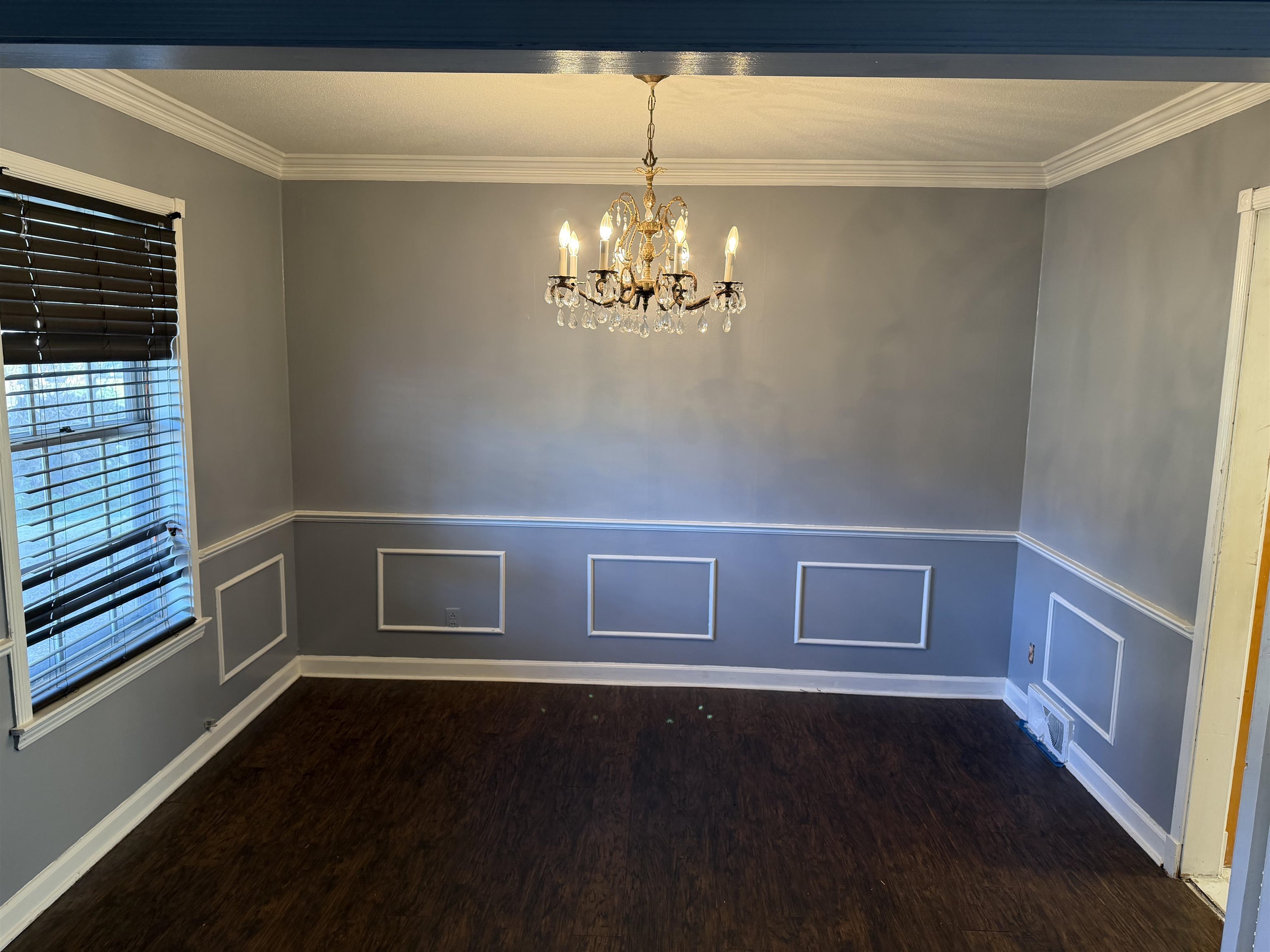 1917 Finley Road Memphis, TN 38116 - Photo 4 of 8 a view of an empty room with a window
