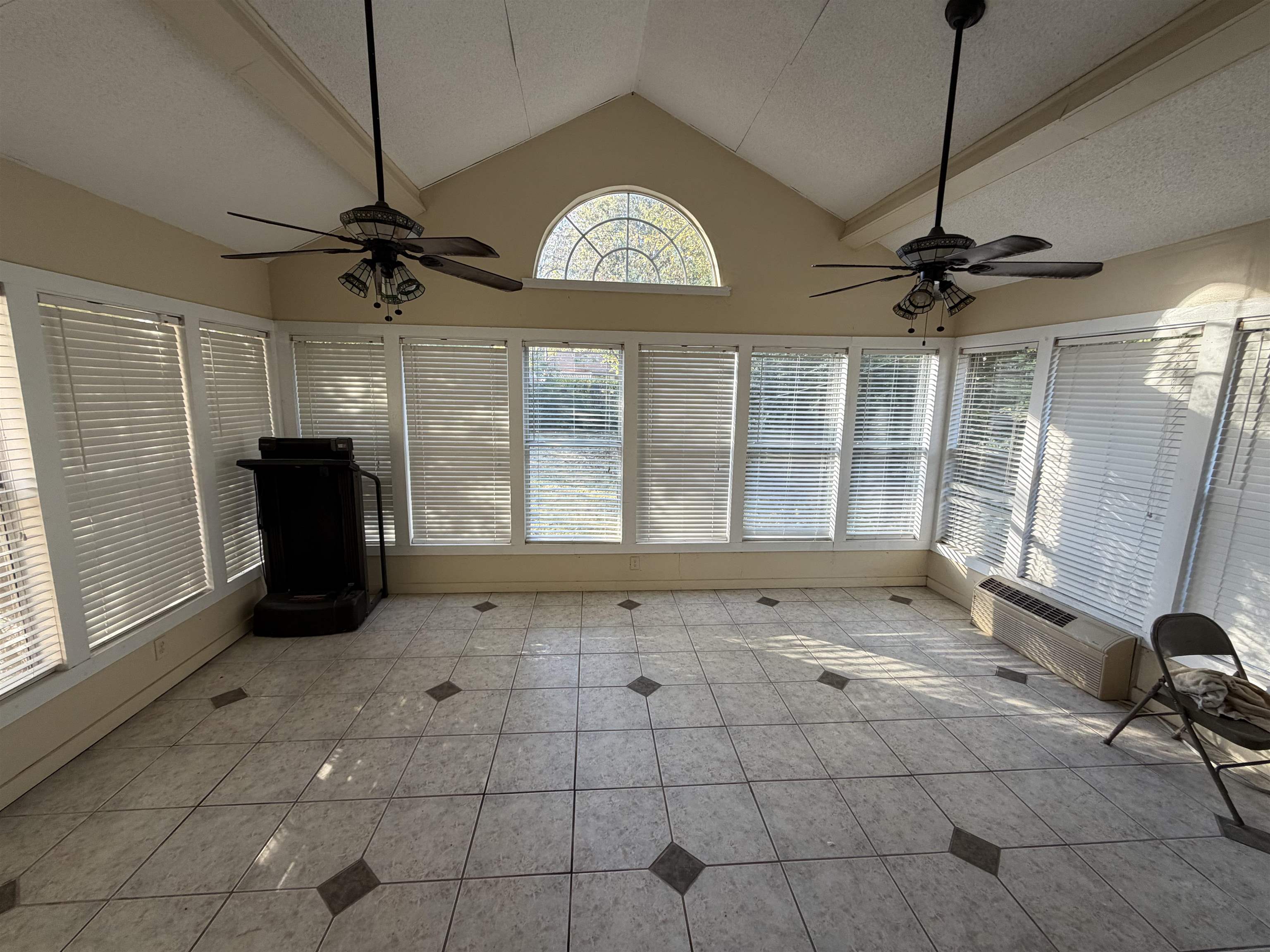 1917 Finley Road Memphis, TN 38116 - Photo 5 of 8 a view of an empty room with a window