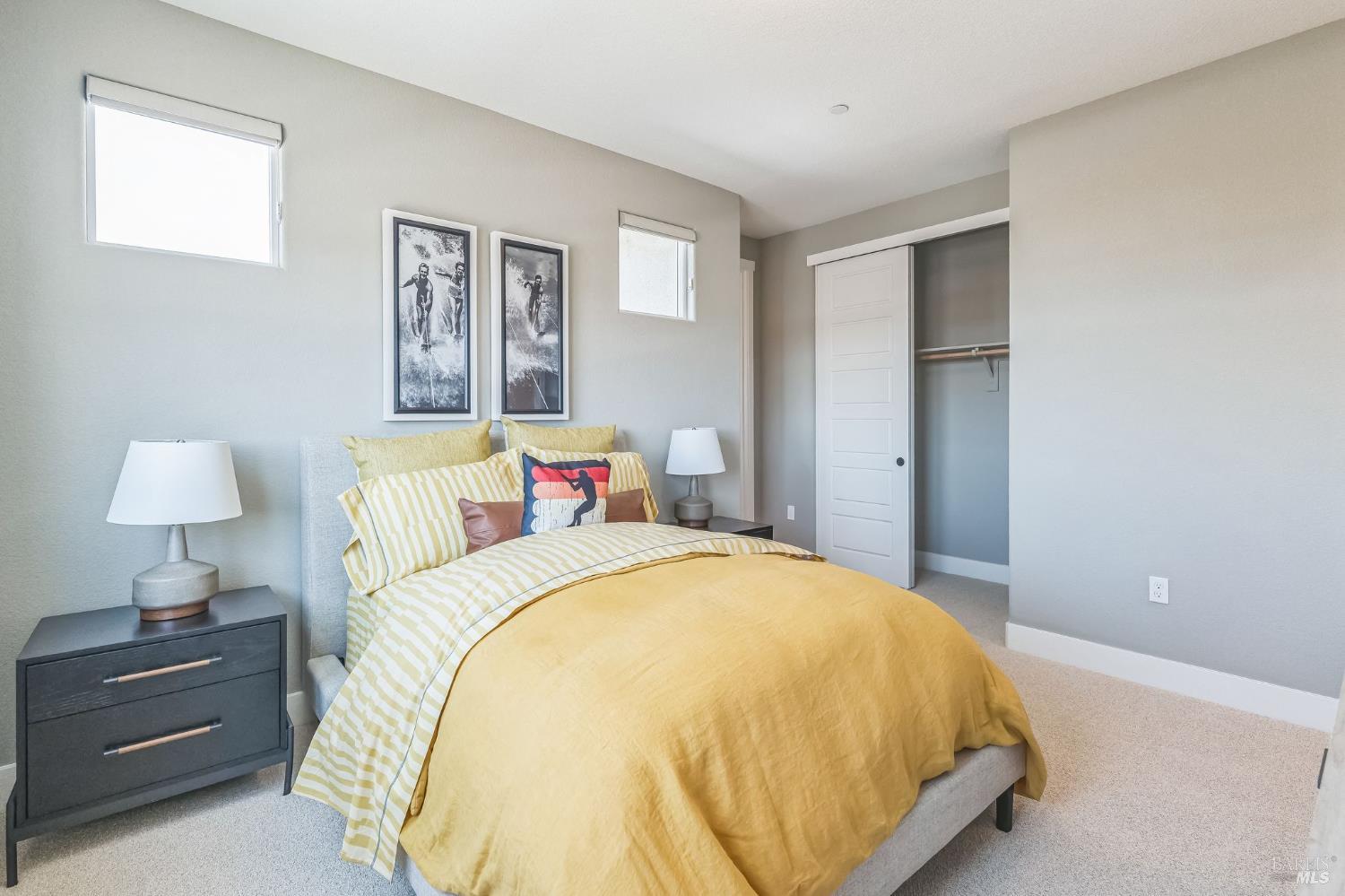 400 June Court Oakley, CA 94561 - Photo 21 of 33 a spacious bedroom with a bed and a lamp