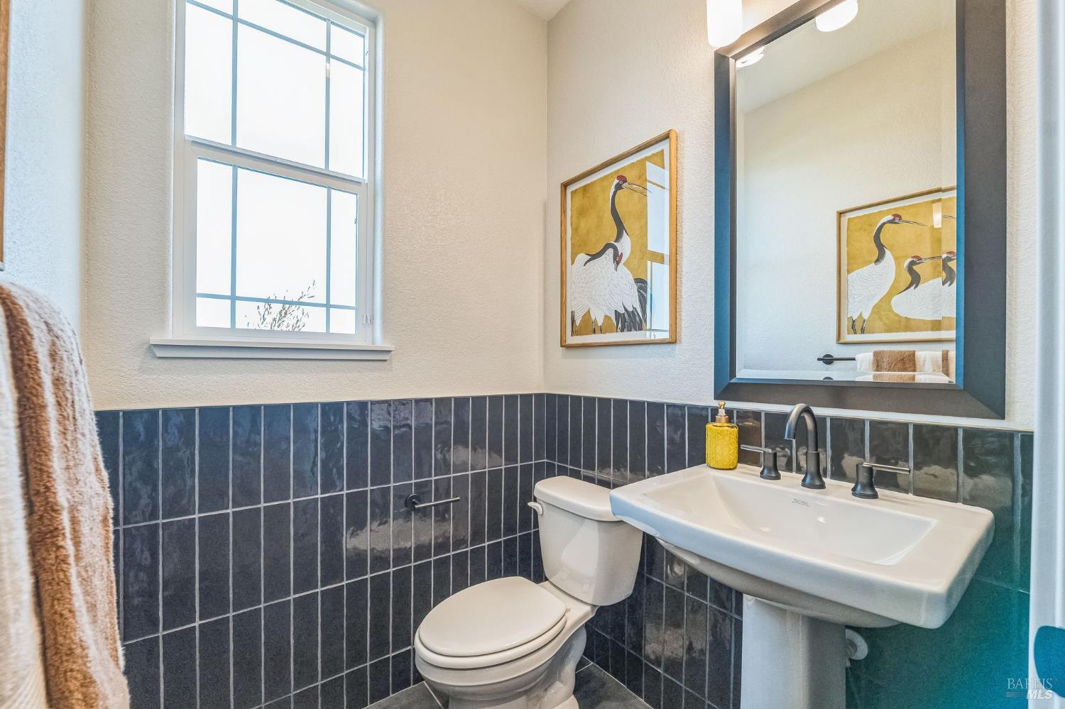 400 June Court Oakley, CA 94561 - Photo 23 of 33 a bathroom with a sink a toilet and a window