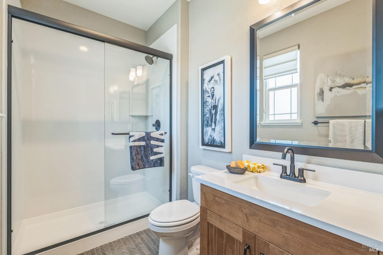 400 June Court Oakley, CA 94561 - Photo 25 of 33 a bathroom with a sink a toilet and shower