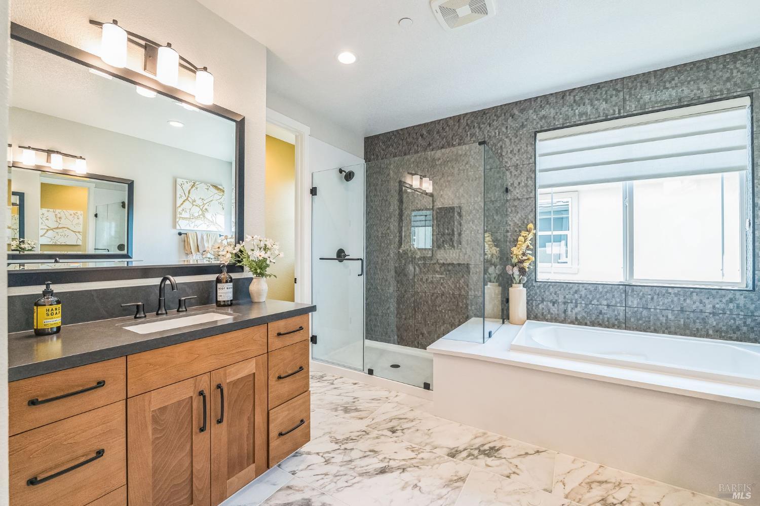 400 June Court Oakley, CA 94561 - Photo 26 of 33 a spacious bathroom with a tub sink and mirror