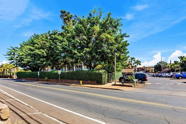 a view of a street with a building and a street