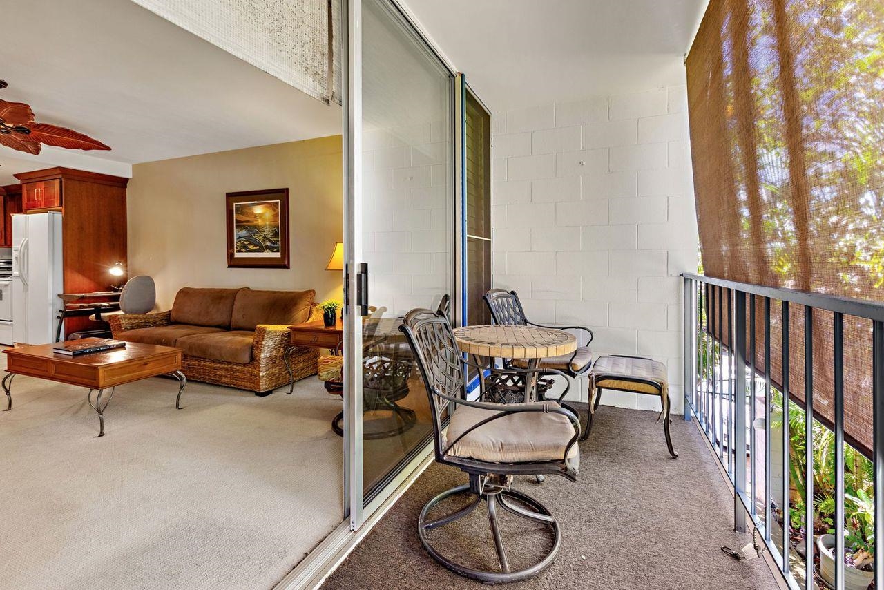 3750 Lower Honoapiilani Road, Unit 202 Lahaina, HI 96761 - Photo 4 of 22 a living room with furniture a couch and a potted plant