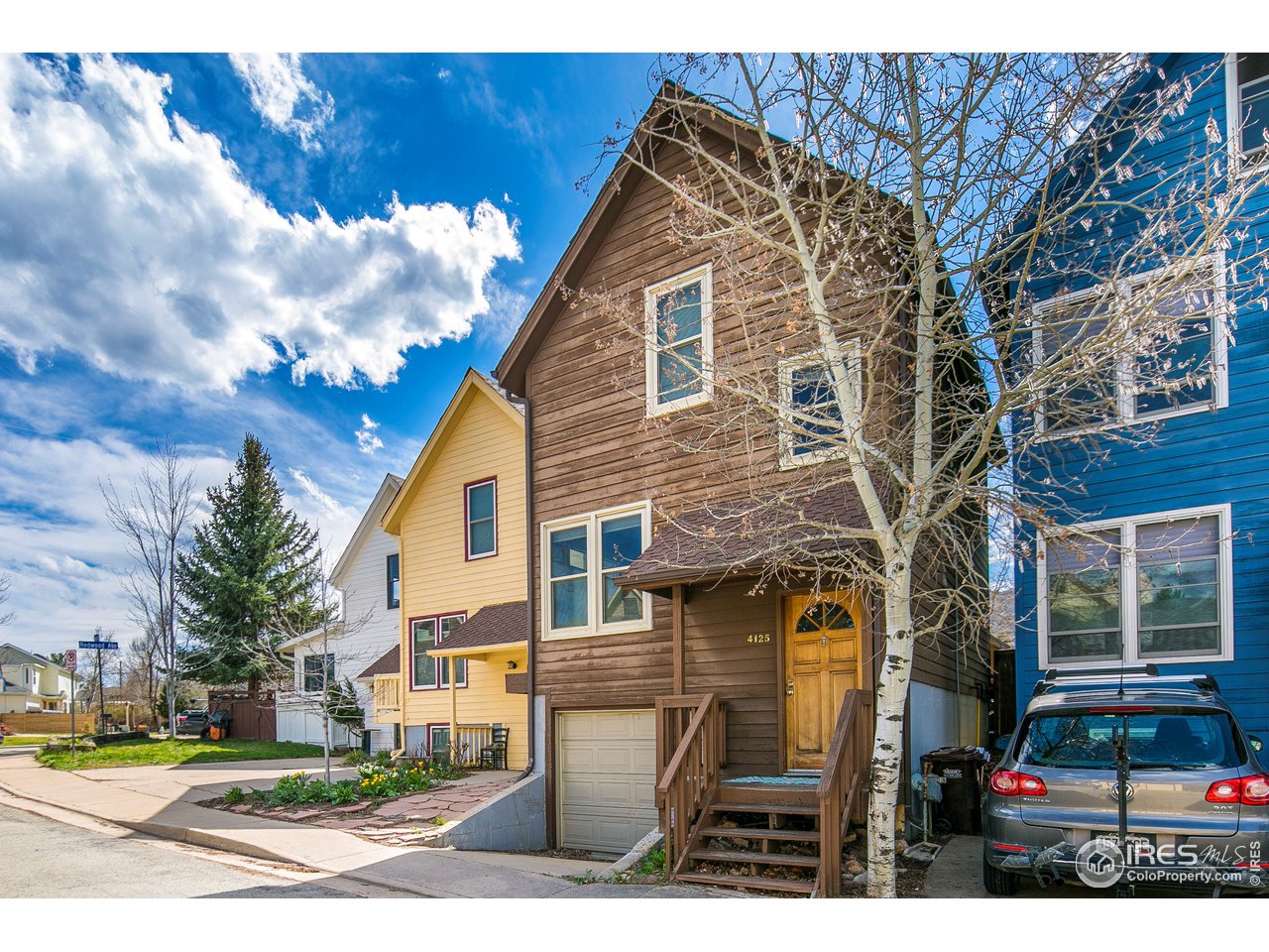 4125 Riverside Avenue Boulder, CO 80304 - Photo 1 of 29 a front view of a house with a yard