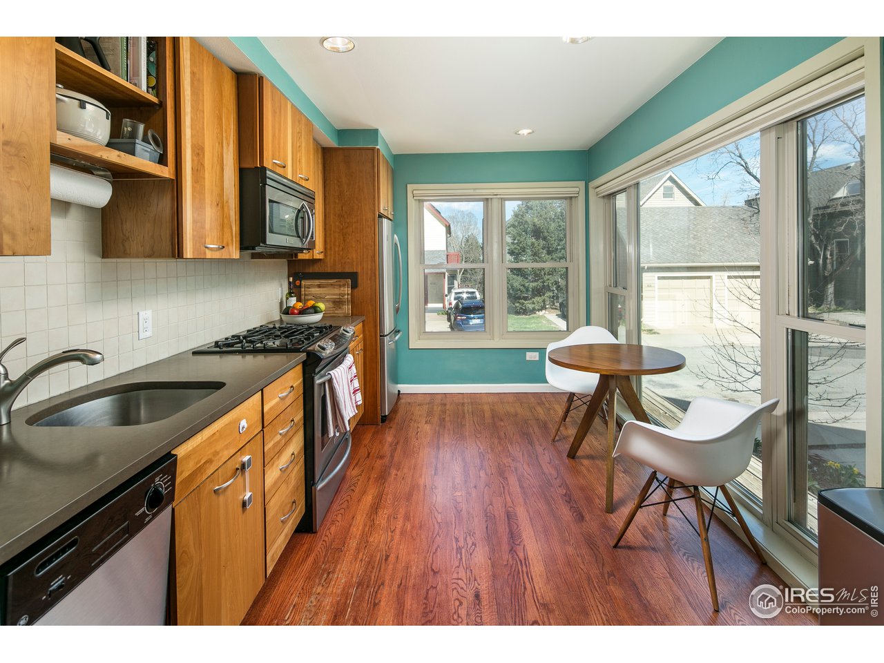 4125 Riverside Avenue Boulder, CO 80304 - Photo 10 of 29 a kitchen that has a sink a stove and wooden floor