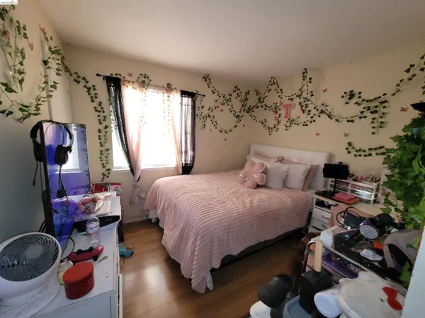 a bed room with a bed and a couch