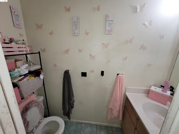 a bathroom with a sink and toilet