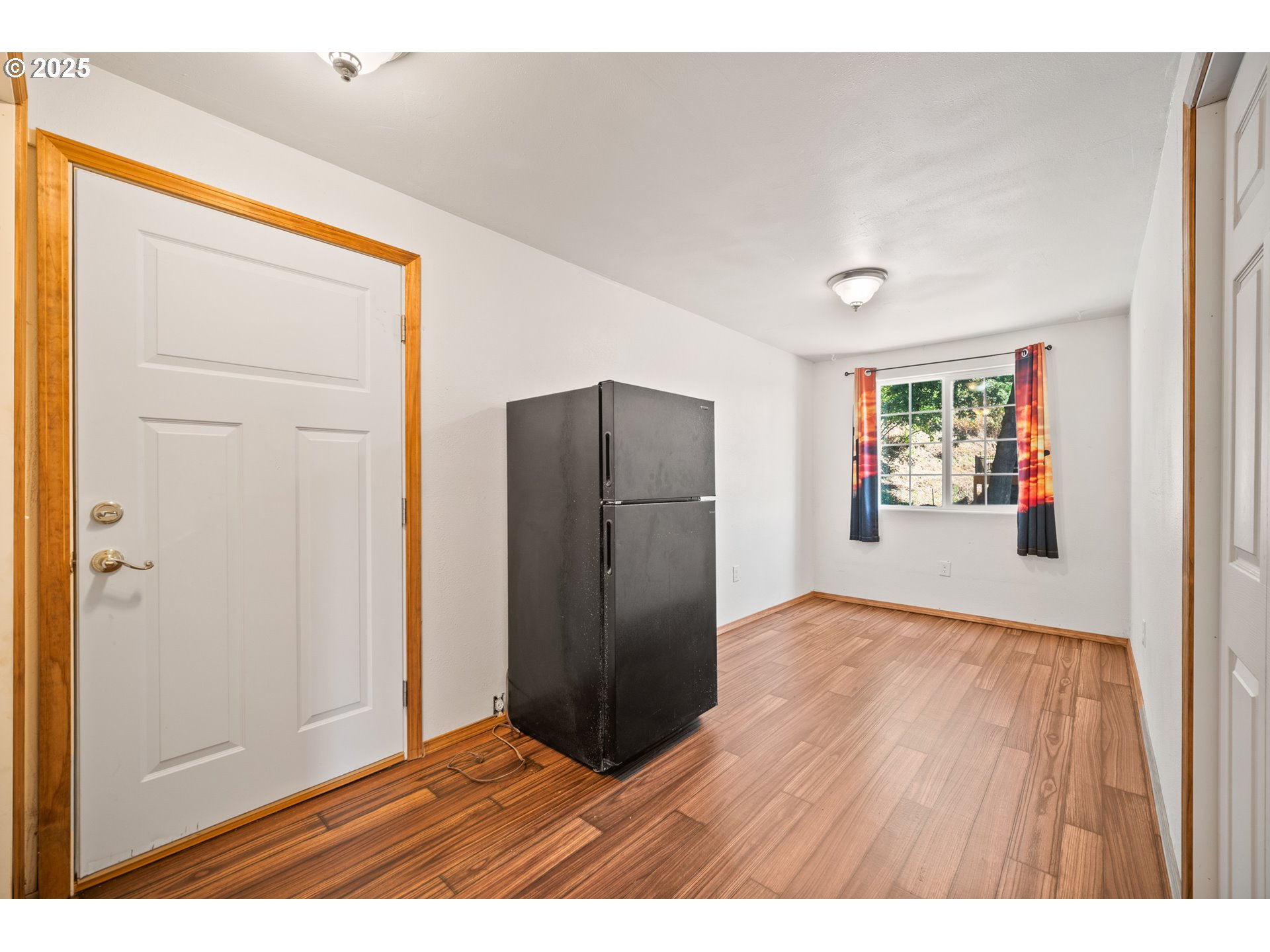 2229 Northwest 6th Place Camas, WA 98607 - Photo 12 of 31 a view of an empty room with wooden floor