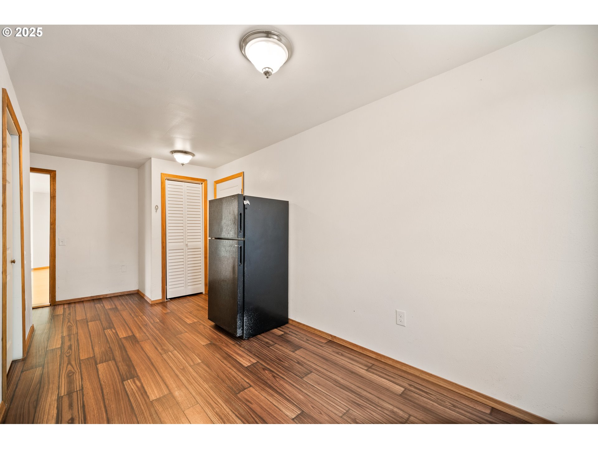 2229 Northwest 6th Place Camas, WA 98607 - Photo 13 of 31 a view of an empty room with wooden floor