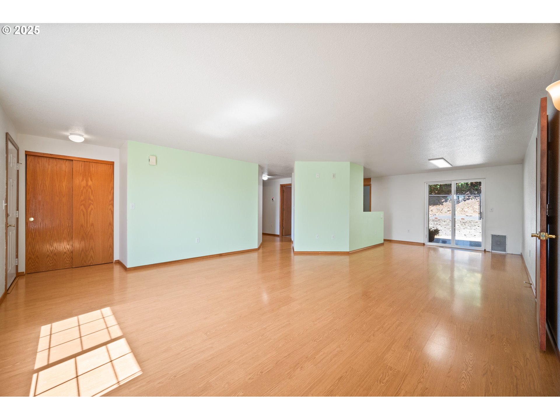 2229 Northwest 6th Place Camas, WA 98607 - Photo 14 of 31 a view of empty room with wooden floor