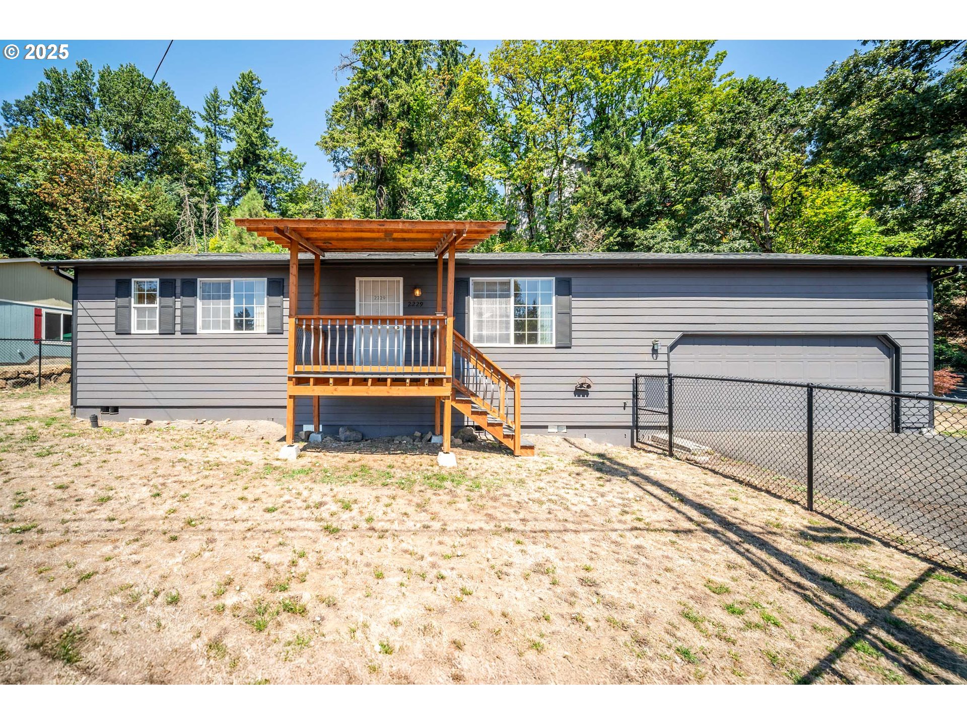 2229 Northwest 6th Place Camas, WA 98607 - Photo 24 of 31 a house view with a backyard space