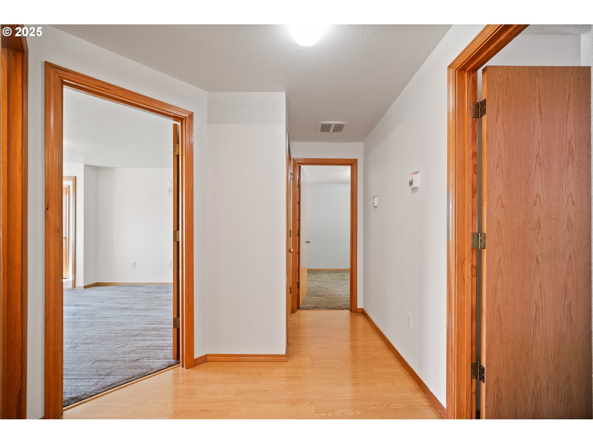 2229 Northwest 6th Place Camas, WA 98607 - Photo 4 of 31 a view of a hallway with wooden floor