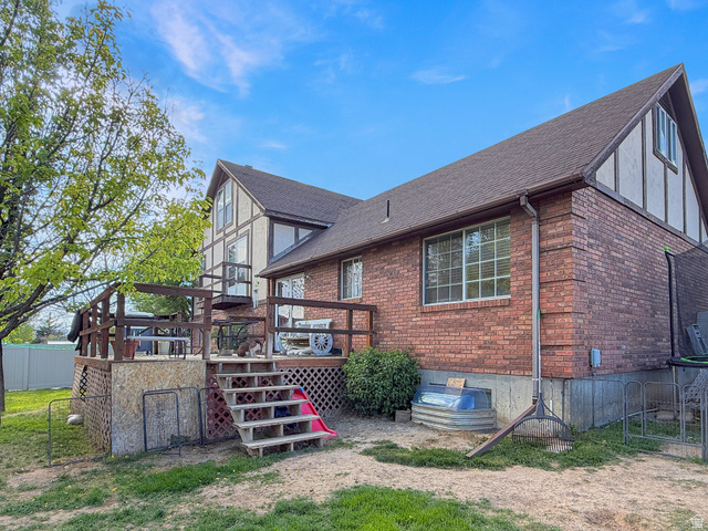 1716 Sagewood Road Price, UT 84501 - Photo 72 of 73 Rear exterior with a multi-level wood deck and steps