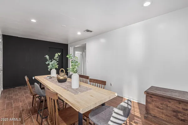 a view of a dining room with furniture