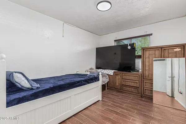 a bathroom with a toilet a sink and a shower