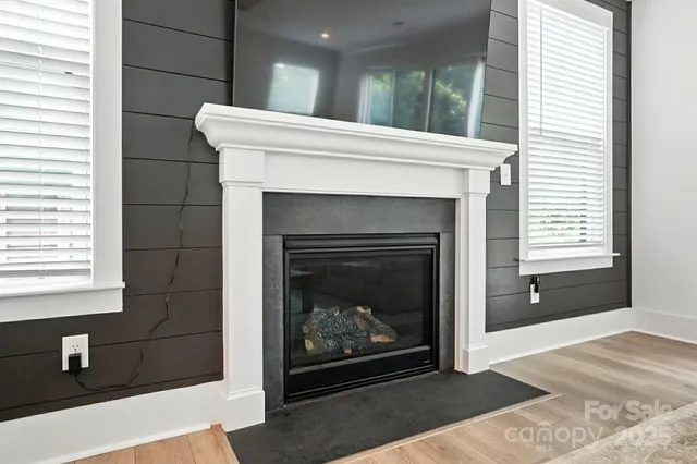 a living room with a fireplace