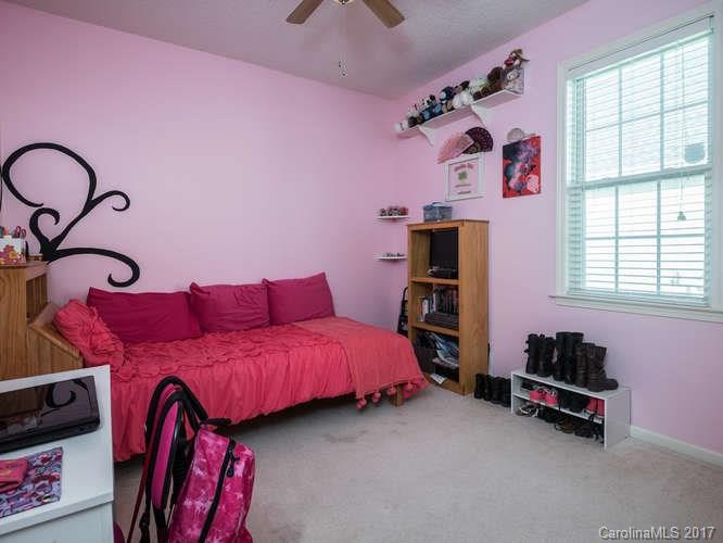 8 Morning Mist Road Fletcher, NC 28732 - Photo 14 of 24 a bed room with a bed and a window
