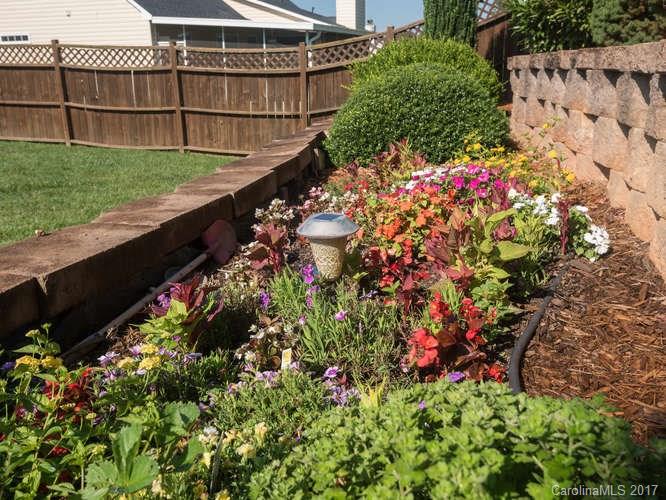8 Morning Mist Road Fletcher, NC 28732 - Photo 21 of 24 a view of a garden with wooden fence