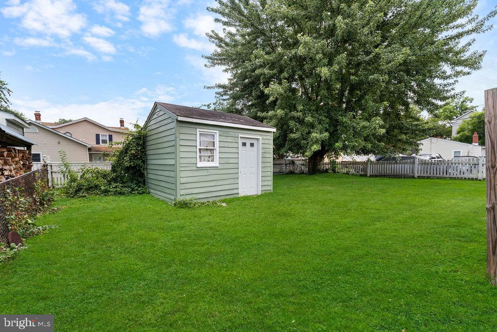 38 4th Street Laurel, MD 20707 - Photo 21 of 27 a view of a house with a backyard