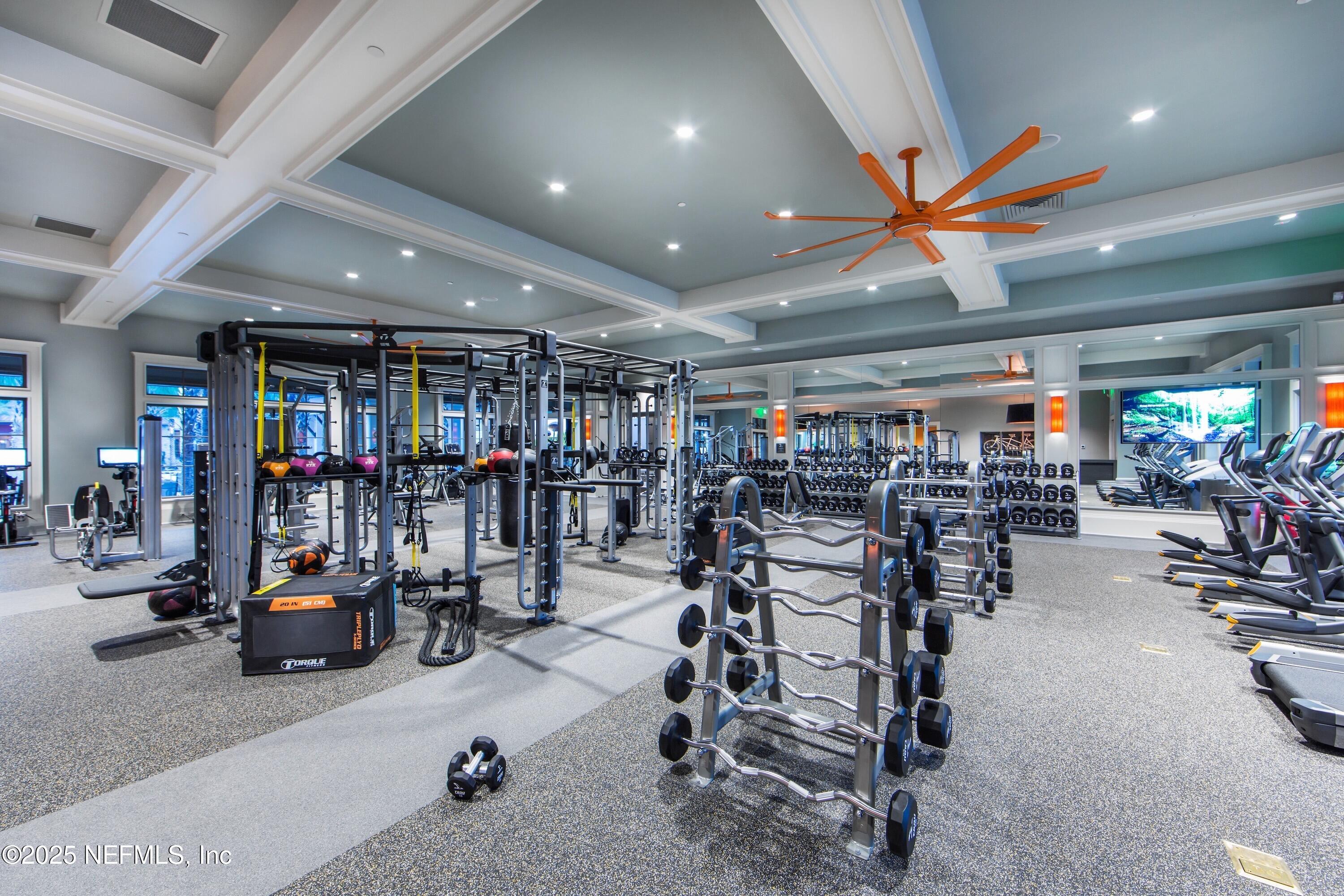 522 Kingbird Drive St. Augustine, FL 32092 - Photo 3 of 59 a view of a room with gym equipment