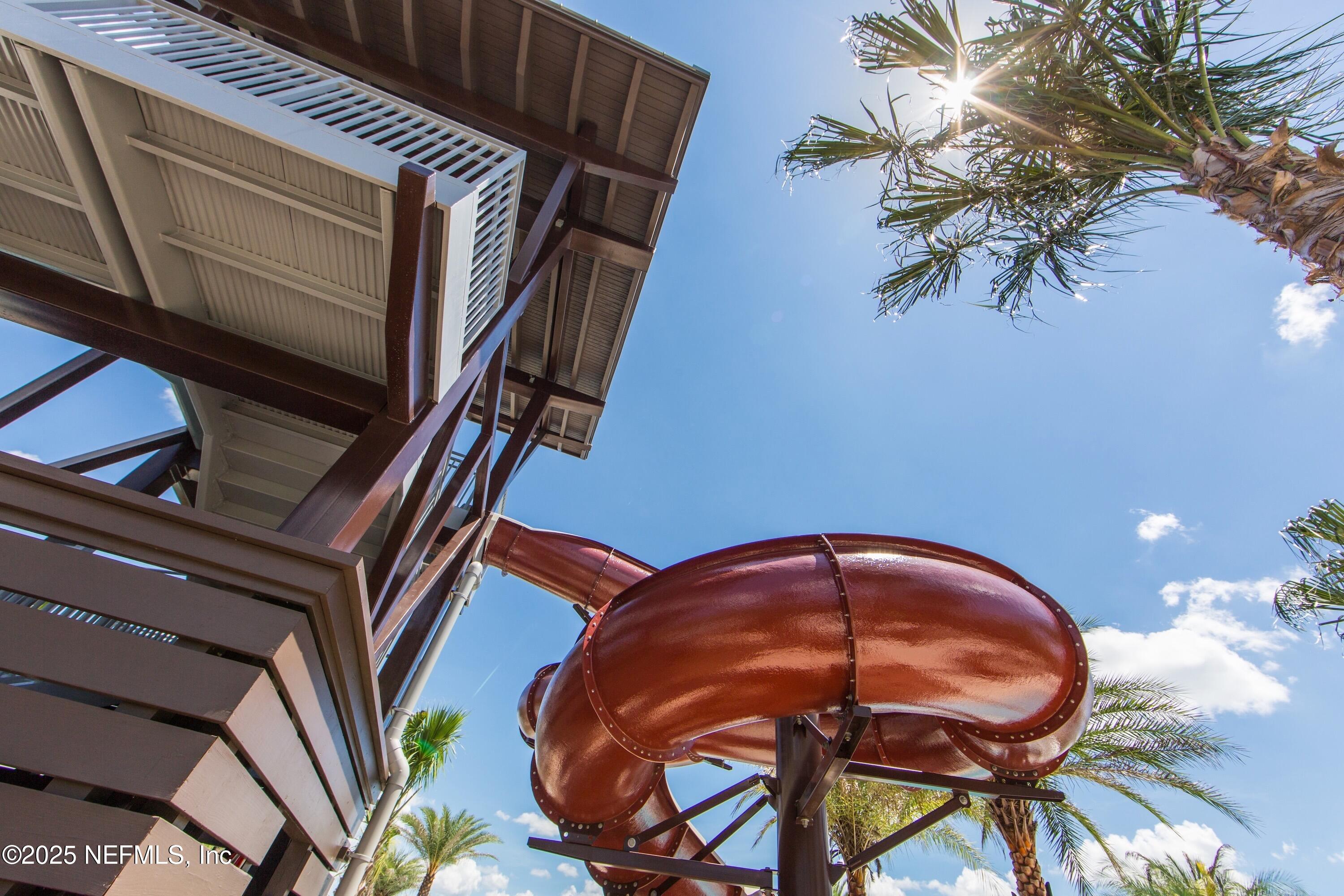 522 Kingbird Drive St. Augustine, FL 32092 - Photo 36 of 59 a backyard of a house with table and chairs