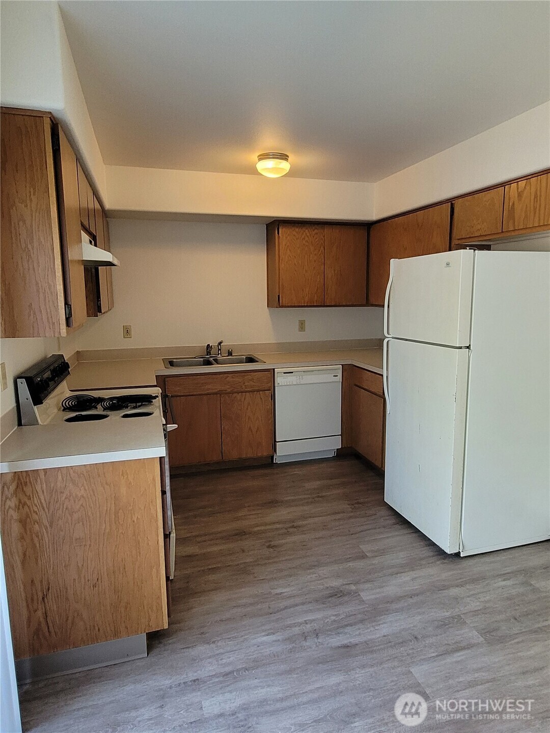 1830 West Crouse Street Moses Lake, WA 98837 - Photo 12 of 17 a view of kitchen and wooden floor