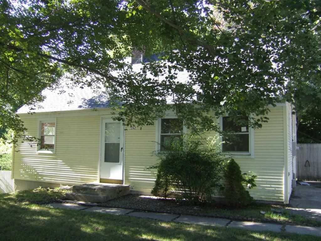 1262 Old Colchester Road Montville, CT 06370 - Photo 1 of 1 a front view of a house with a yard