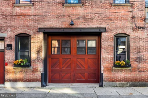 a brick house with a door