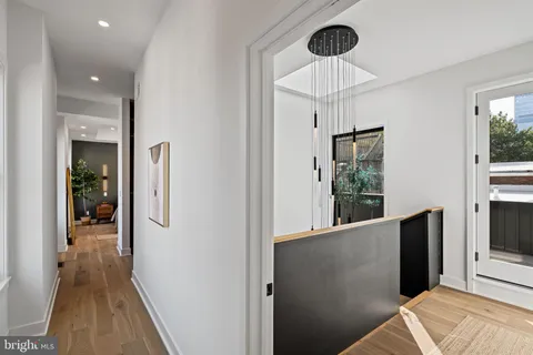 a bathroom with a sink a mirror and a shower