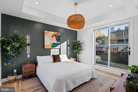 a bathroom with a sink and shower