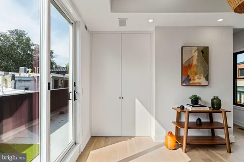 a view of a balcony with chairs