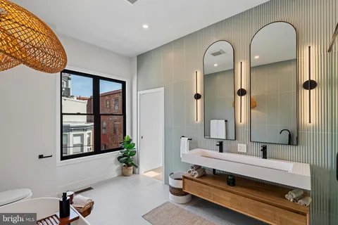 a front view of a house with brick walls