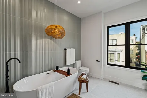 a view of city with tall buildings