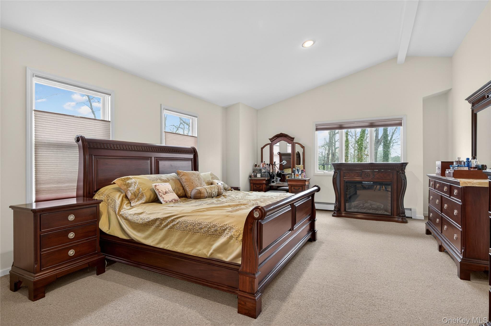 43 Highwood Road East Norwich, NY 11732 - Photo 11 of 32 a bedroom with a bed and a dresser in it