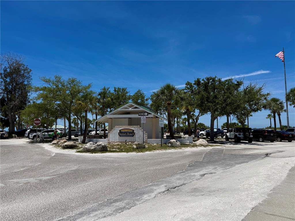 1004 Connecticut Road Tarpon Springs, FL 34689 - Photo 51 of 57 a view of road with a building and trees in the background
