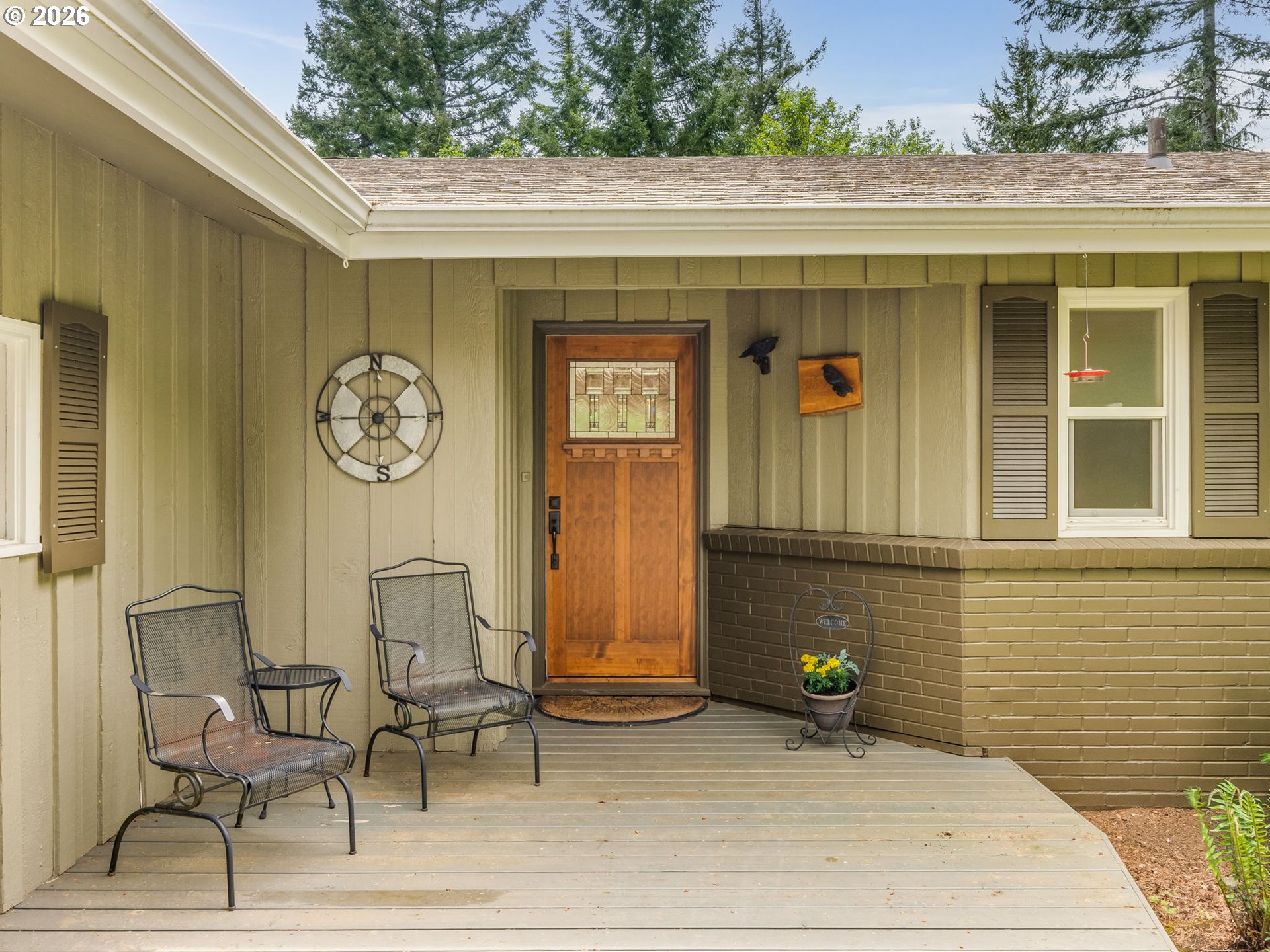 48140 Southeast Linhart Butte Road Sandy, OR 97055 - Photo 4 of 47 a couple of table chair in front of a door