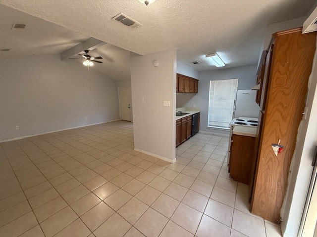 1610 Hazelwood Street, Unit A Conroe, TX 77301 - Photo 4 of 10 an empty room with windows