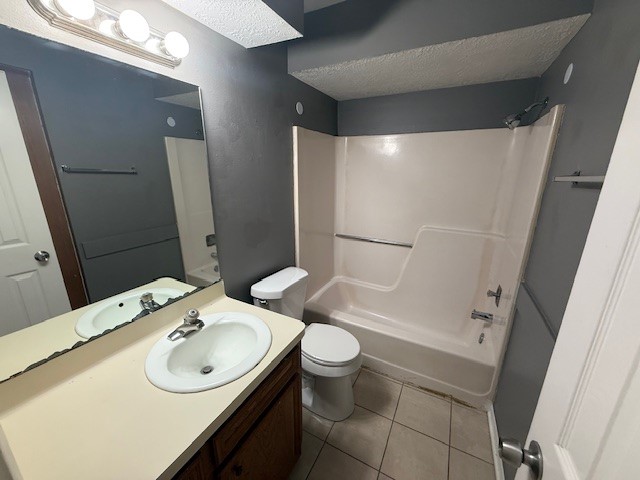 1610 Hazelwood Street, Unit A Conroe, TX 77301 - Photo 7 of 10 a bathroom with a sink and mirror with toilet